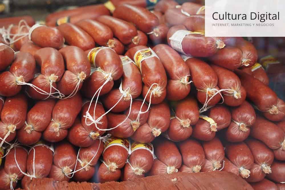 A pile of sausages in a store window